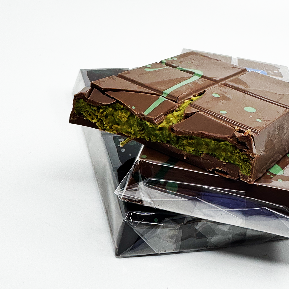 ndulge in Groveland Confections’ Big Bars — handcrafted, stuffed chocolate bars bursting with bold flavors like caramel, peanut butter, and pistachio crunch. Order your gourmet chocolate bar today!