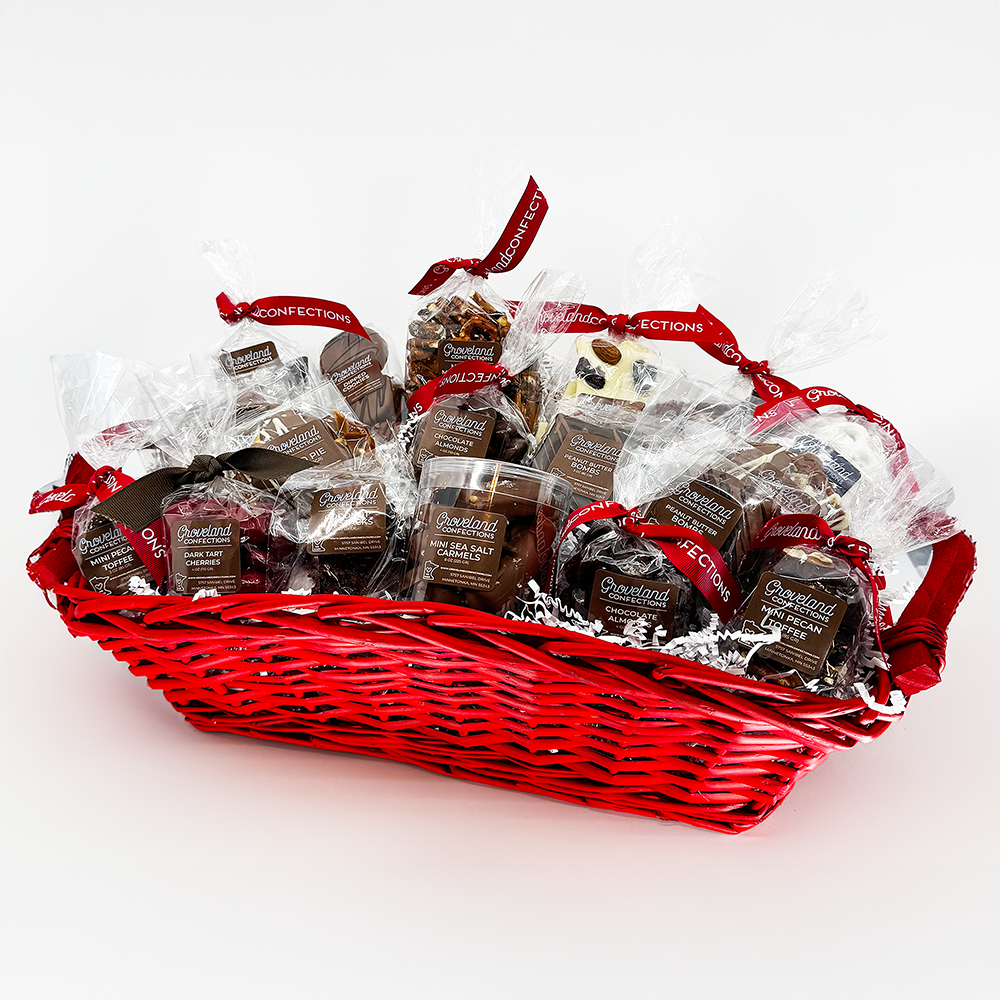 A beautiful red basket filled to the brim with delicious chocolates.