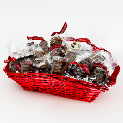 A beautiful red basket filled to the brim with delicious chocolates.