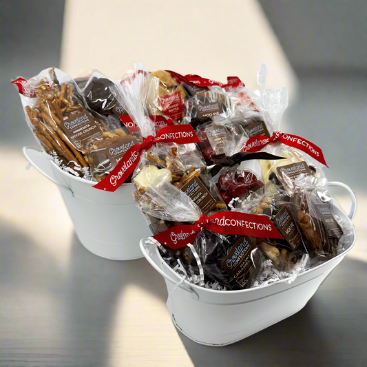 A sleek tin basket with a selection of chocolates